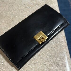 Salvatore Ferragamo Black Clutch with Gold Accent